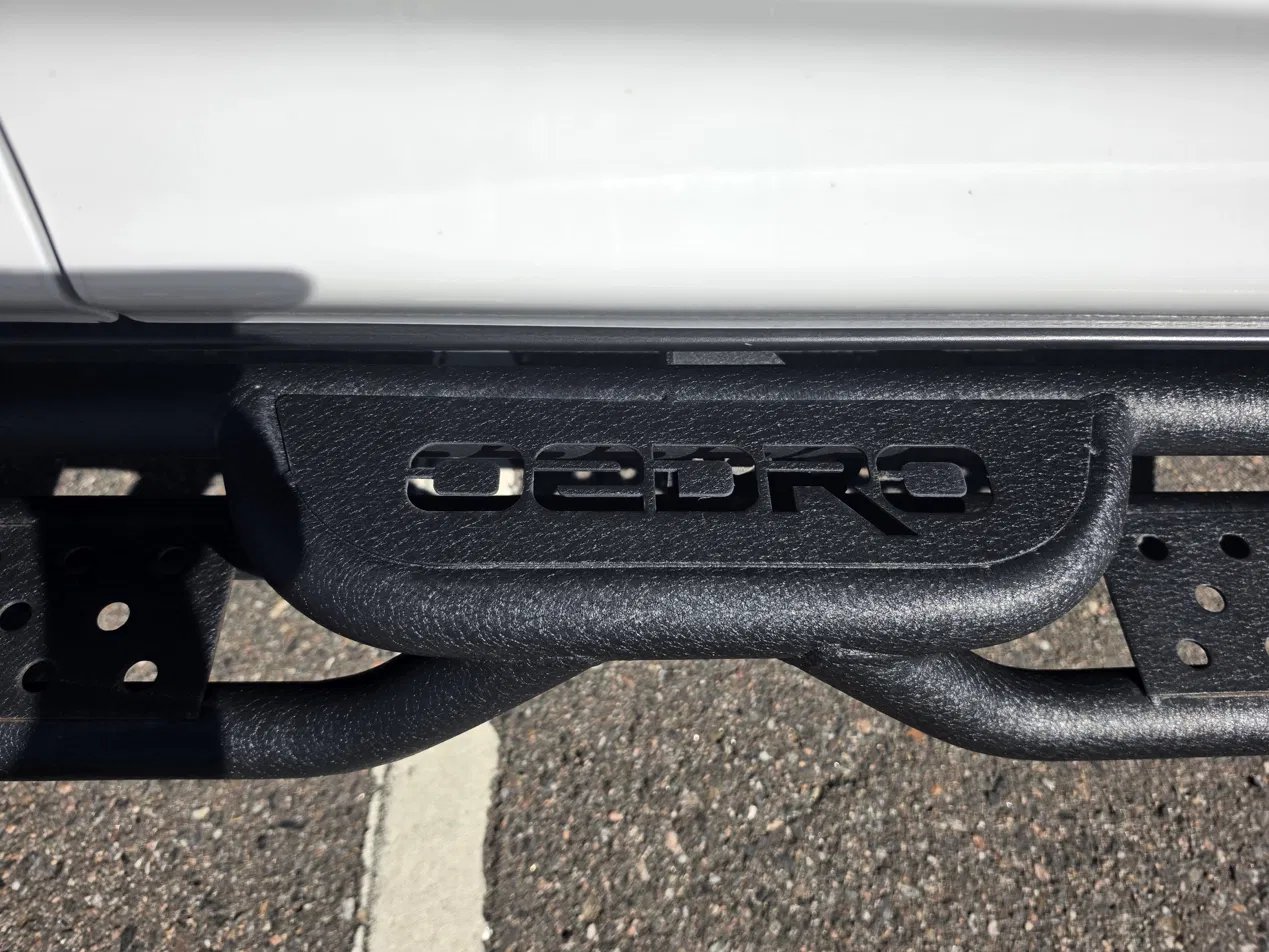 Close-up of the drop-step pad and tube on the 4Runner